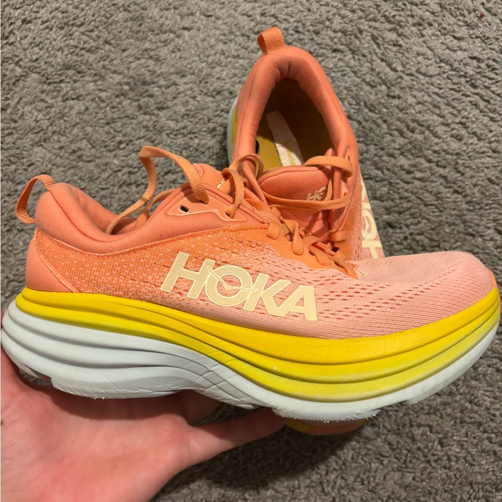 Hoka Coral and Yellow Athletic Shoes